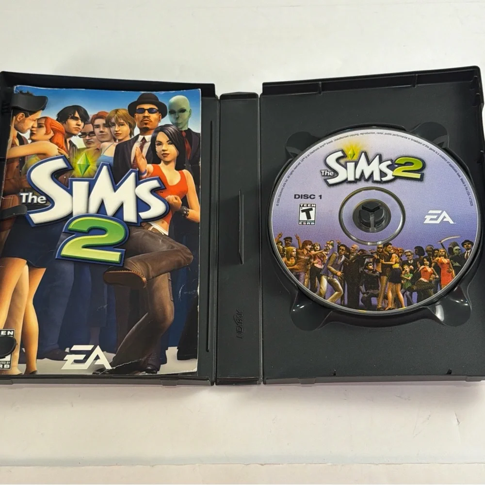 The Sims 2 2004 PC CD Rom Contains all 4 Discs and Instructions Pre-Owned